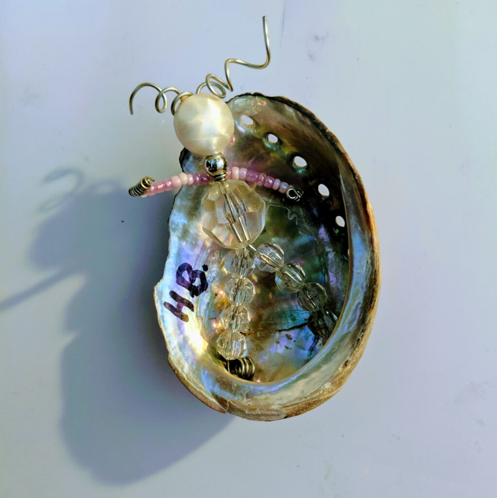 Magnetic Beadman on Abalone shell